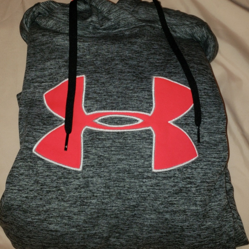 a grey and pink under armour sweatshirt